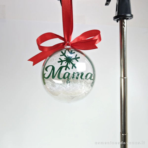 Kalėdinis žaisliukas - burbulas su vardu viduje ir rausvu kaspinu.