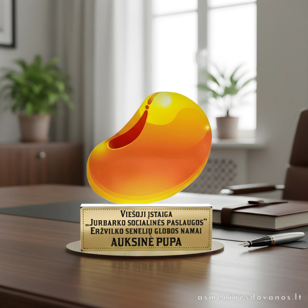 Apdovanojimas, auksinė pupa. Su graviruotu tekstu ant aukso spalvos plokštelės. Apdovanojimas pupos formos.