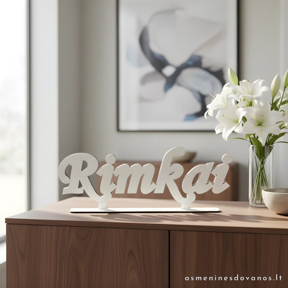 Lazeriu pjautas žodis, suklijuotas, gali būti pavardė, vardas ar vieta