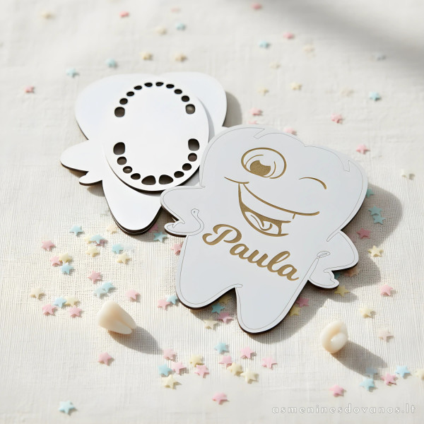 Dėžutė vaiko pieniniams dantukams sudėti. Dėžutė danties formos.